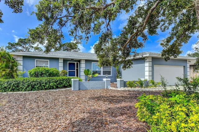 7719 9th Avenue Dr NW, Bradenton, FL 34209 - single story home with stucco siding and a garage