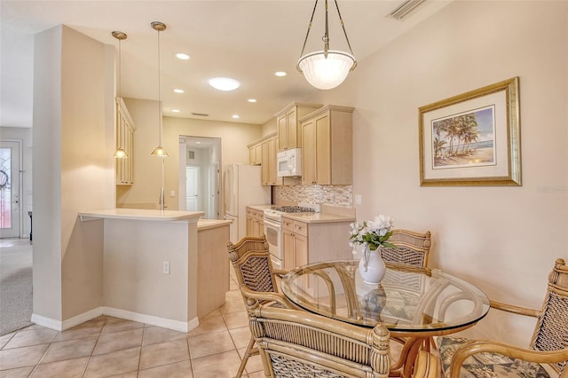 4322 Reflections Pkwy, Sarasota, FL 34233 - dining room featuring light tile patterned floors and baseboards