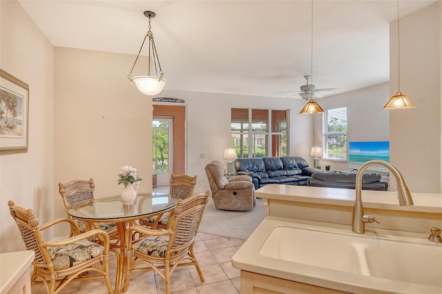 4322 Reflections Pkwy, Sarasota, FL 34233 - dining room featuring light tile patterned flooring and ceiling fan