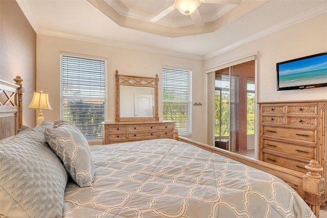 4322 Reflections Pkwy, Sarasota, FL 34233 - bedroom featuring ornamental molding, a tray ceiling, and ceiling fan
