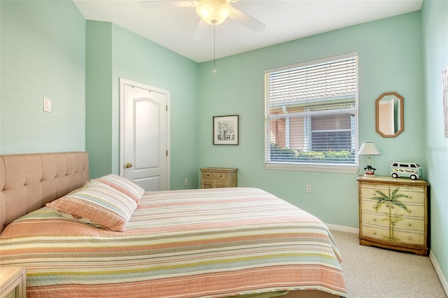 4322 Reflections Pkwy, Sarasota, FL 34233 - carpeted bedroom featuring baseboards and ceiling fan