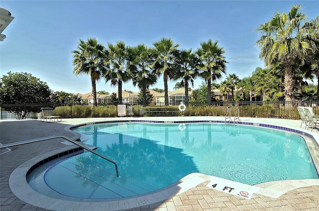 4322 Reflections Pkwy, Sarasota, FL 34233 - community pool with fence and a patio area