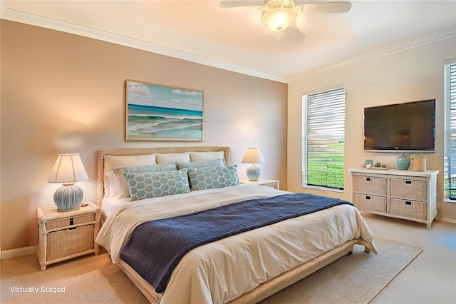 4322 Reflections Pkwy, Sarasota, FL 34233 - carpeted bedroom featuring ornamental molding, multiple windows, and ceiling fan