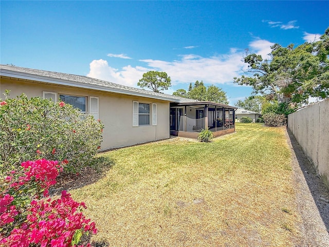 2188 Corinne Ct S Unit A, Saint Petersburg, FL 33712 - fenced backyard with a sunroom