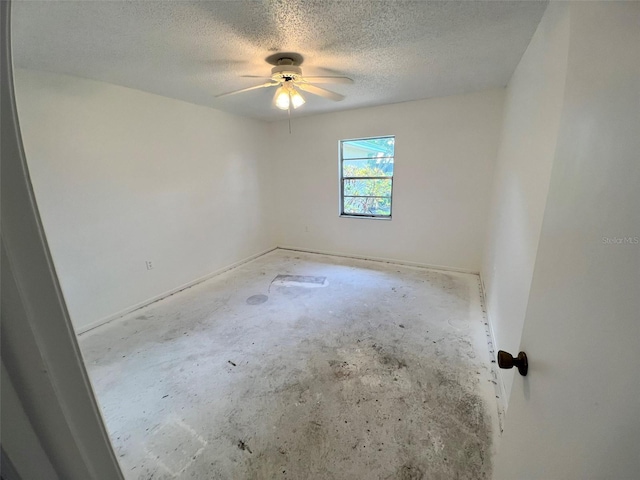 2188 Corinne Ct S Unit A, Saint Petersburg, FL 33712 - unfurnished room featuring a textured ceiling and a ceiling fan