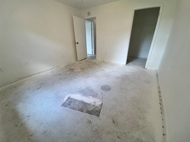 2188 Corinne Ct S Unit A, Saint Petersburg, FL 33712 - unfurnished bedroom with unfinished concrete flooring and a closet