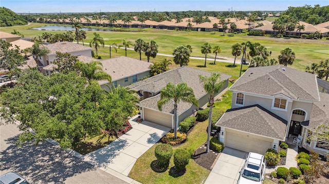 315 Heritage Isles Way, Bradenton, FL 34212 - aerial perspective of suburban area with a local golf course and a nearby body of water