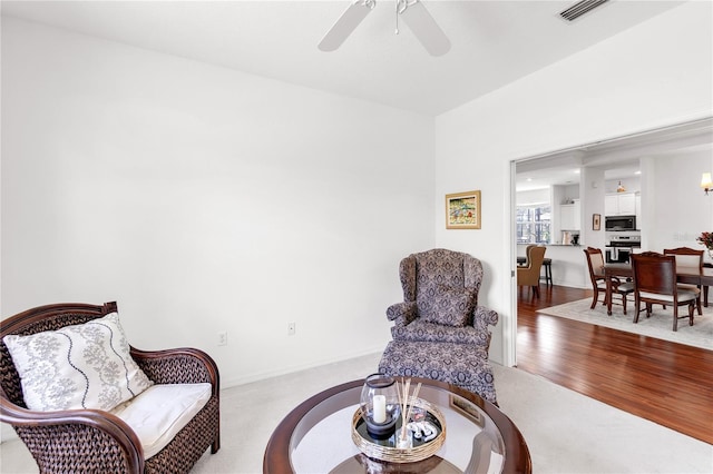 315 Heritage Isles Way, Bradenton, FL 34212 - living area with a ceiling fan and wood finished floors