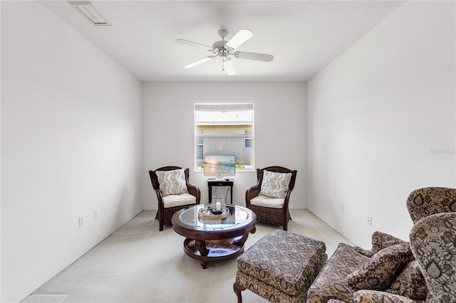 315 Heritage Isles Way, Bradenton, FL 34212 - living area with light carpet and a ceiling fan