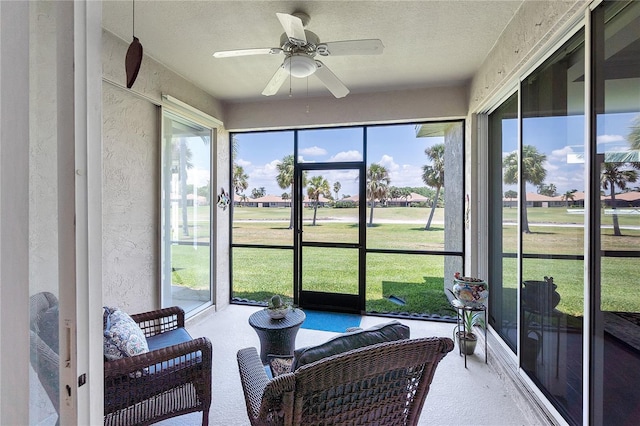 315 Heritage Isles Way, Bradenton, FL 34212 - sunroom featuring a ceiling fan and plenty of natural light