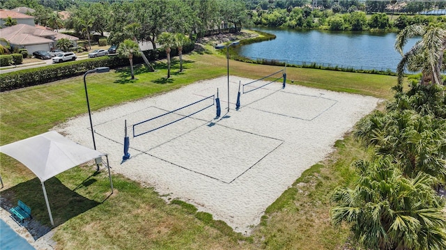 315 Heritage Isles Way, Bradenton, FL 34212 - view of home's community with volleyball court, a water view, and a yard