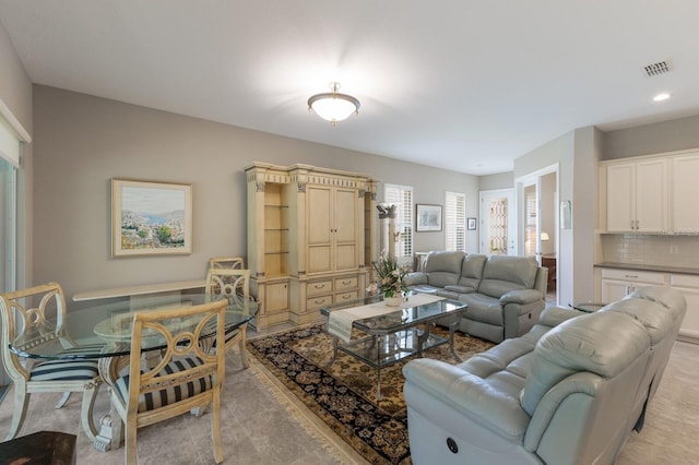 living room featuring recessed lighting