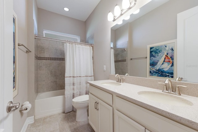 full bath featuring toilet, double vanity, shower / bath combo with shower curtain, and tile patterned flooring