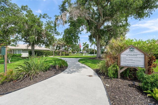6664 Deering Cir, Sarasota, FL 34240 - view of home's community with a lawn