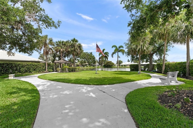 6664 Deering Cir, Sarasota, FL 34240 - view of community featuring a gazebo, a yard, and a water view