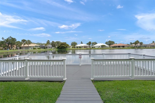6664 Deering Cir, Sarasota, FL 34240 - dock area with a residential view, a deck with water view, and a lawn