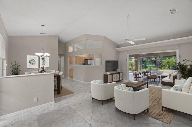 6664 Deering Cir, Sarasota, FL 34240 - living room featuring a chandelier, marble finish floors, ceiling fan, and high vaulted ceiling