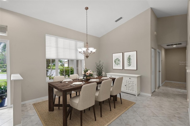 6664 Deering Cir, Sarasota, FL 34240 - dining room with high vaulted ceiling, light marble finish flooring, a chandelier, and baseboards