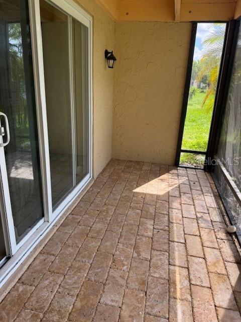 2616 Hidden Lake Dr N Unit A, Sarasota, FL 34237 - view of unfurnished sunroom