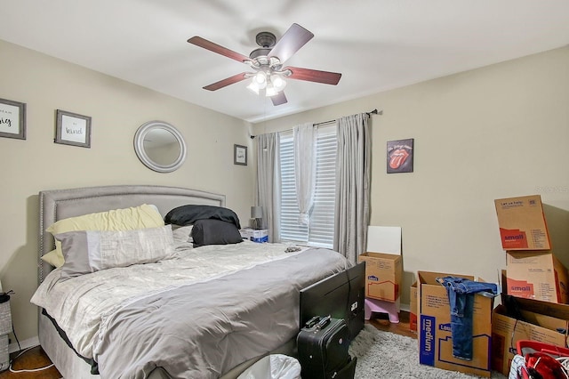 5681 Bidwell Pkwy Unit 102, Sarasota, FL 34233 - bedroom featuring ceiling fan and wood finished floors