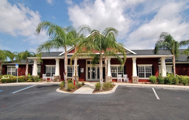 5681 Bidwell Pkwy Unit 102, Sarasota, FL 34233 - view of property featuring uncovered parking