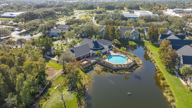 5681 Bidwell Pkwy Unit 102, Sarasota, FL 34233 - aerial view of property's location with a pool area, nearby suburban area, and a nearby body of water