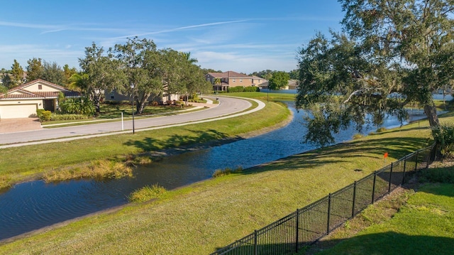 5681 Bidwell Pkwy Unit 102, Sarasota, FL 34233 - view of property's community featuring a water view and driveway