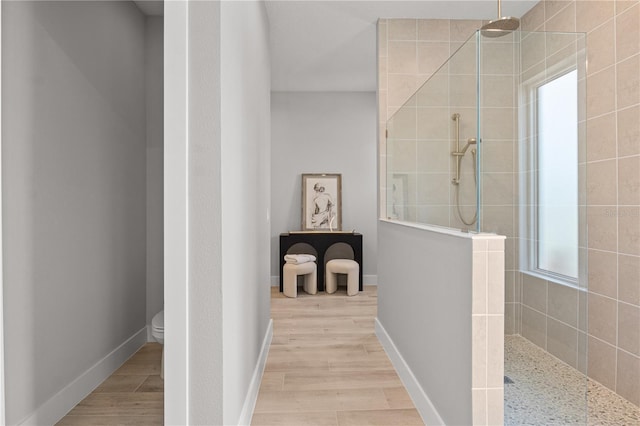 5910 Red Mangrove Ln, Bradenton, FL 34210 - full bathroom with a walk in shower, wood finished floors, and toilet