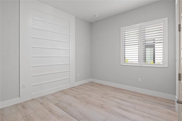 5910 Red Mangrove Ln, Bradenton, FL 34210 - empty room featuring light wood-style floors and baseboards