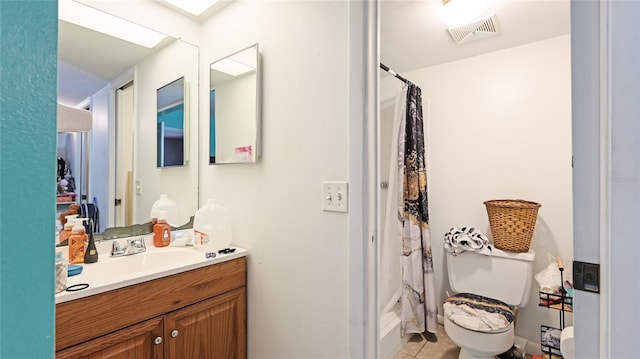 5964 7th Ave W Unit 5964, Bradenton, FL 34209 - bathroom with vanity, curtained shower, toilet, and tile patterned floors
