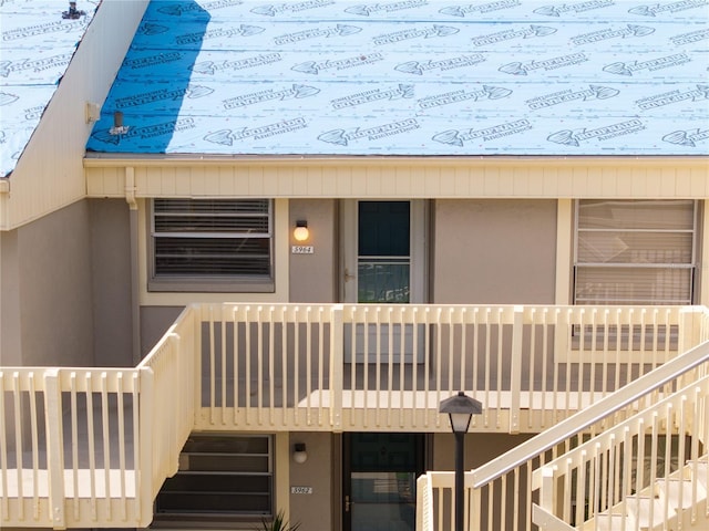 5964 7th Ave W Unit 5964, Bradenton, FL 34209 - property entrance with stucco siding