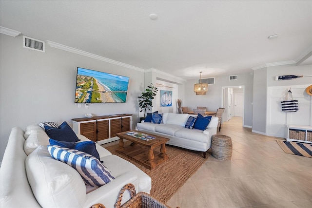 living area featuring crown molding, light tile patterned flooring, a chandelier, and baseboards