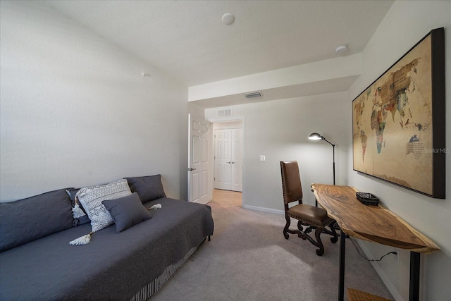 living area featuring light colored carpet