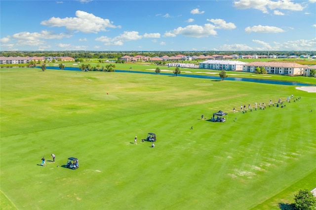 aerial view of a local golf course and a large body of water