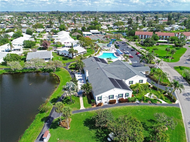aerial view of a nearby body of water and a pool