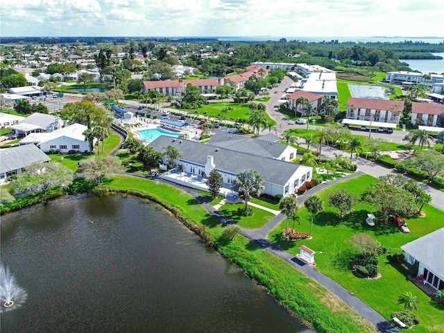 aerial view of a nearby body of water and a pool