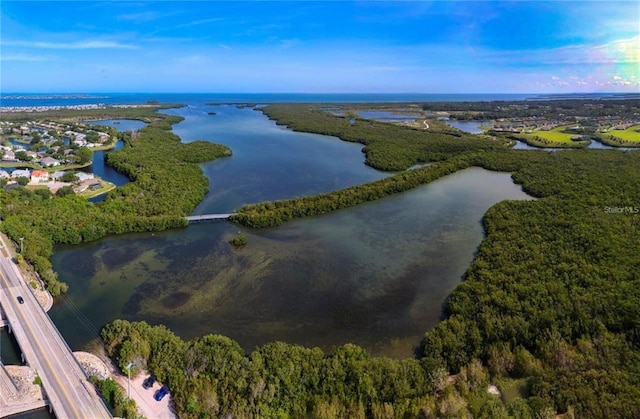 aerial overview of property's location featuring a nearby body of water
