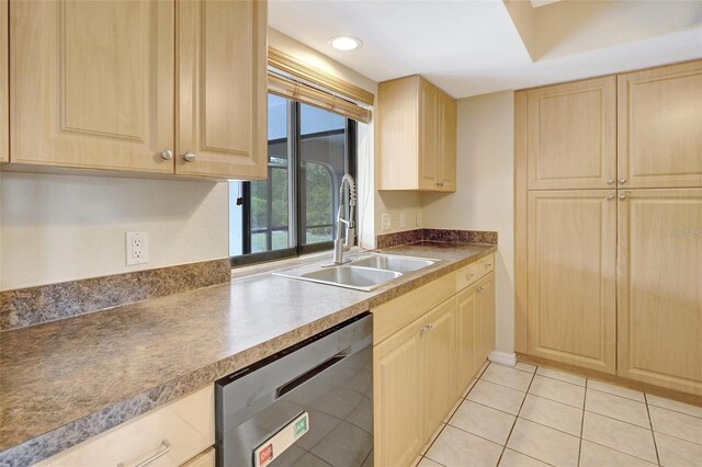 3510 Shawn St, Punta Gorda, FL 33980 - kitchen featuring light brown cabinets, stainless steel dishwasher, a sink, light tile patterned floors, and recessed lighting