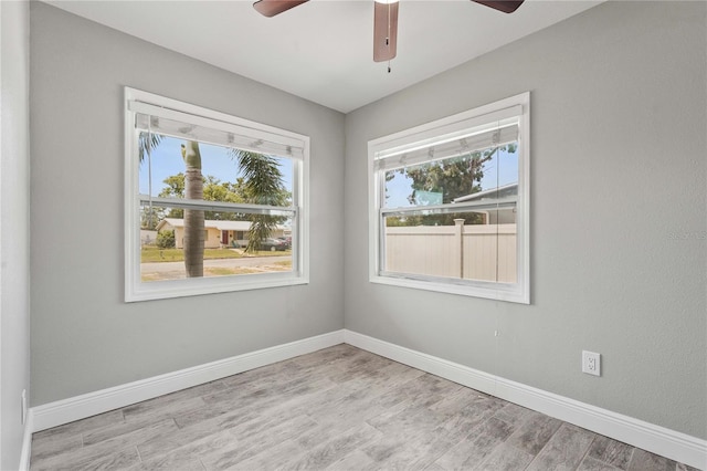 3102 16th Ave W, Bradenton, FL 34205 - unfurnished room featuring a ceiling fan, wood finished floors, and baseboards