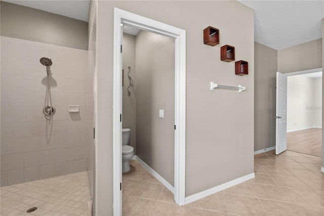 7626 Double Pine Dr, Sarasota, FL 34240 - full bath featuring a stall shower, toilet, and tile patterned flooring