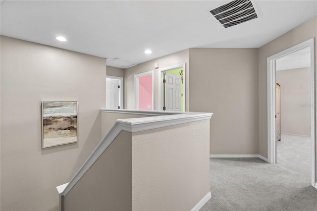 7626 Double Pine Dr, Sarasota, FL 34240 - corridor with light carpet, recessed lighting, and baseboards