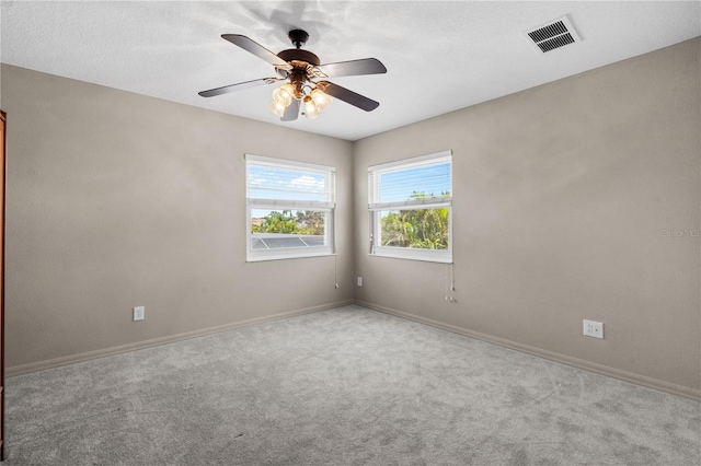 7626 Double Pine Dr, Sarasota, FL 34240 - carpeted empty room featuring baseboards and ceiling fan