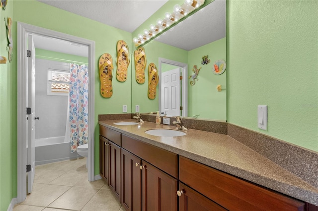 7626 Double Pine Dr, Sarasota, FL 34240 - full bathroom with double vanity, toilet, tile patterned floors, and shower / bath combo with shower curtain