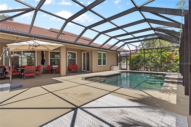 7626 Double Pine Dr, Sarasota, FL 34240 - swimming pool featuring a patio and glass enclosure