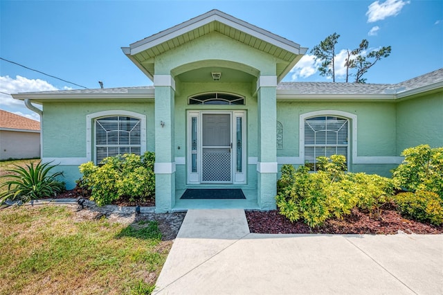 2759 Starview Ave, North Port, FL 34288 - property entrance with stucco siding