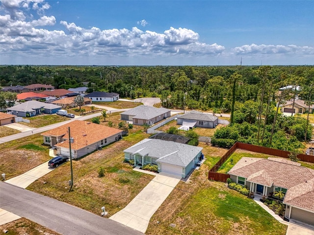 2759 Starview Ave, North Port, FL 34288 - aerial view of residential area featuring a heavily wooded area