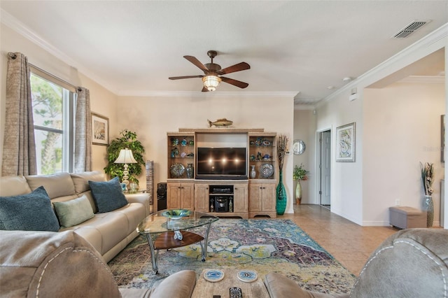 living area featuring ceiling fan, ornamental molding, baseboards, and light tile patterned floors