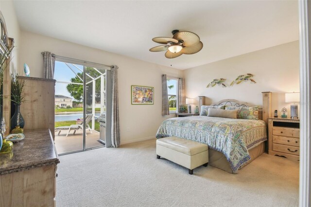 bedroom with access to outside, light carpet, baseboards, and a ceiling fan