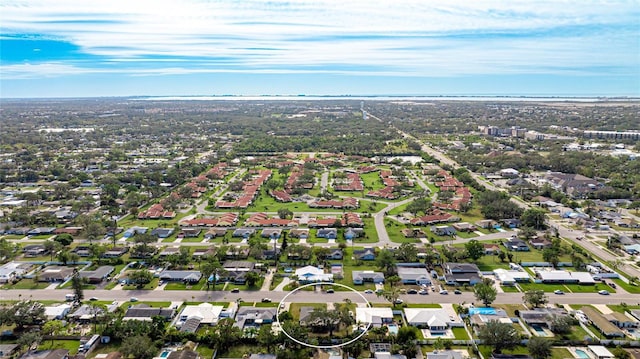 aerial overview of property's location with nearby suburban area