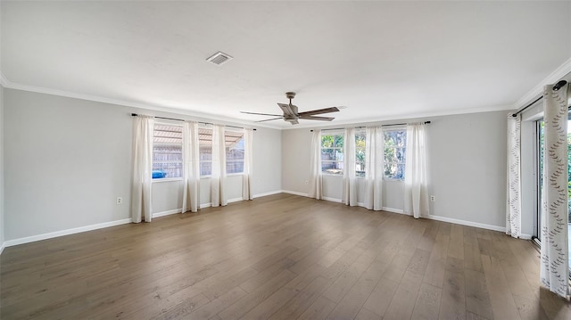 5706 10th Avenue Dr W, Bradenton, FL 34209 - spare room featuring a ceiling fan, ornamental molding, baseboards, and wood finished floors